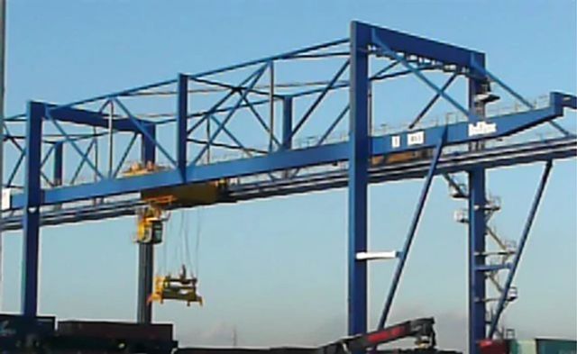A rail mounted gantry crane