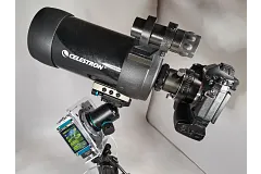 The mechanism with the gearbox and control panel on the outside must be able to rotate the camera and telescope steadily.